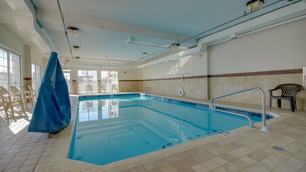a large indoor swimming pool in a hotel